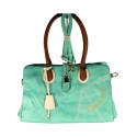FLORA & CO - Sac à main turquoise porté épaule