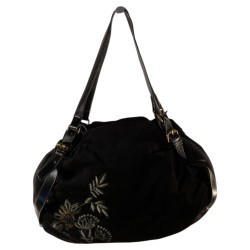 sac à main de couleur noir, en velours côtelé, Laurence C pouvant se porter court sur l'épaule. 1